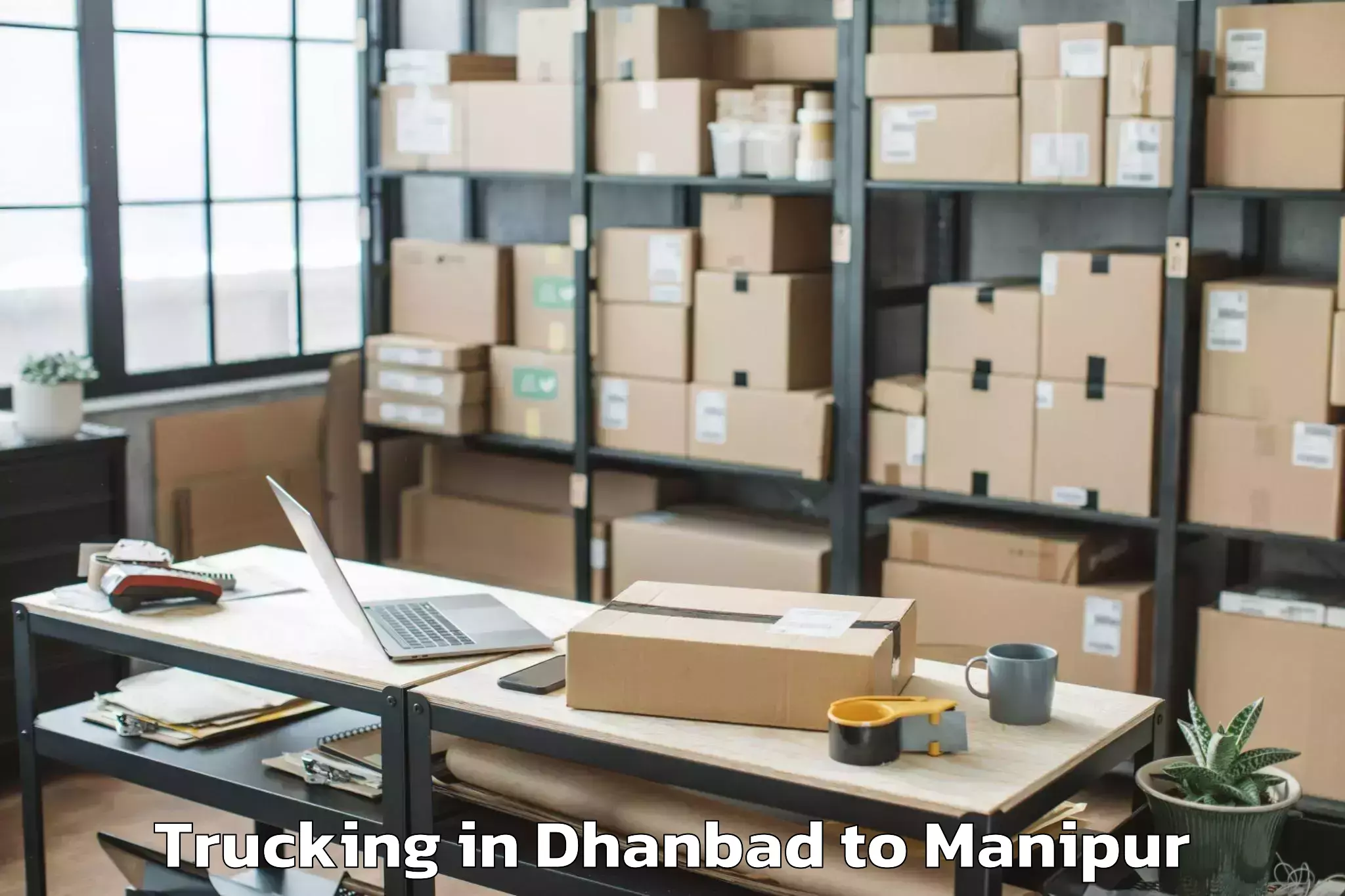 Book Dhanbad to Wangoi Trucking Online